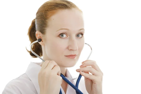 Rossa medico o infermiere posa su sfondo bianco — Foto Stock
