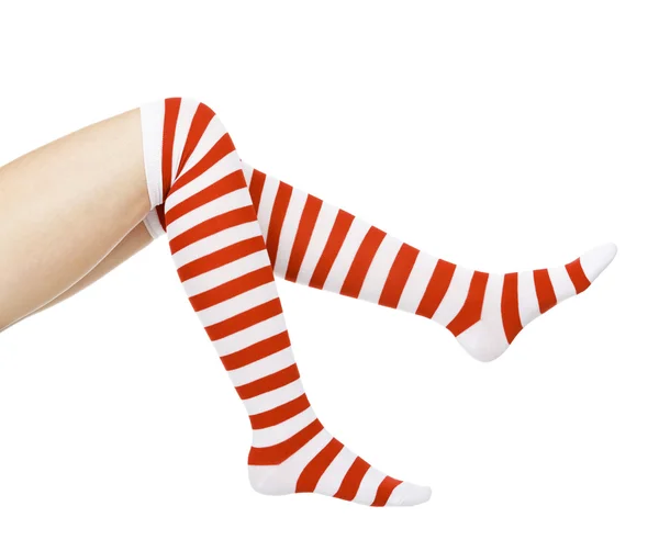 Christmas female legs — Stock Photo, Image