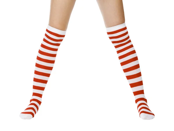 Navidad piernas femeninas — Foto de Stock