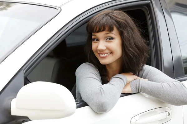 Pretty girl in a car — Stock Photo, Image