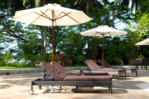 Resort swimming pool side — Stock Photo, Image