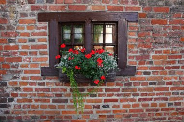 Small window of old medieval house. clipart