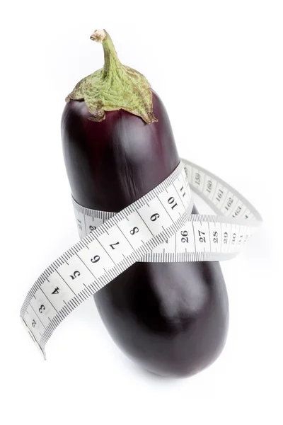Eggplant with measuring tape — Stock Photo, Image