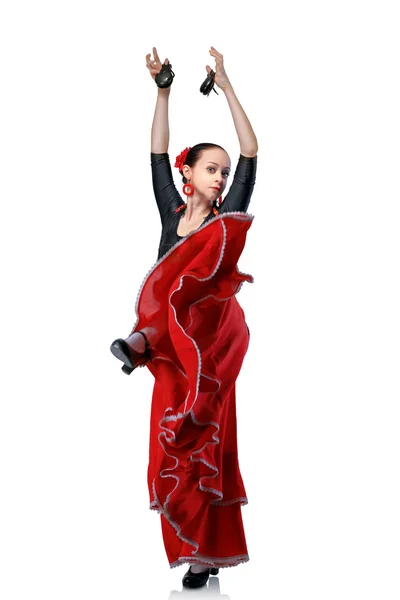 Ung kvinna dansar flamenco med kastanjetter isolerad på vit — Stockfoto