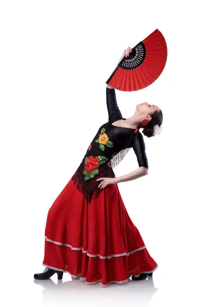 Young woman dancing flamenco with fan isolated on white — Stock Photo, Image