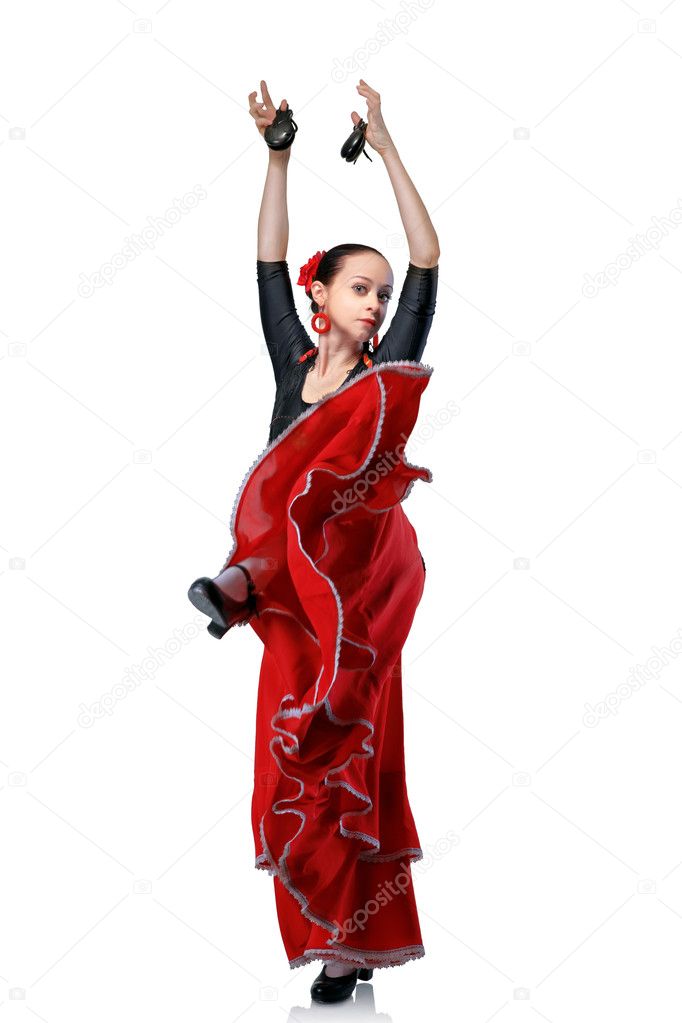Young woman dancing flamenco with castanets isolated on white