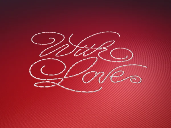 Met liefde gestikt borduurwerk woorden op rood — Stockfoto