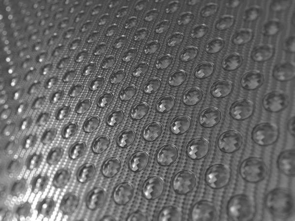 Carbon fibre surface with round shapes pattern — Stock Photo, Image