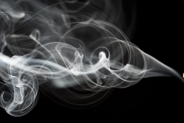 Abstrato preto fumaça redemoinhos no preto — Fotografia de Stock