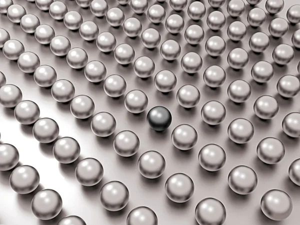 Schwarze einzigartige Perle unter gewöhnlichen Perlen in Reihen — Stockfoto