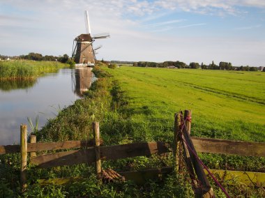 Windmill landscape in Holland clipart