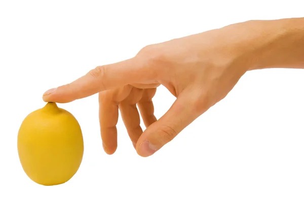Sárga citrom és a férfi keze — Stock Fotó