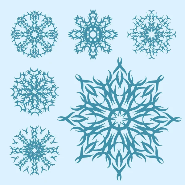 Vector set of different snowflakes — Stock Vector