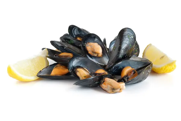 Mussels with lemon isolated Royalty Free Stock Images