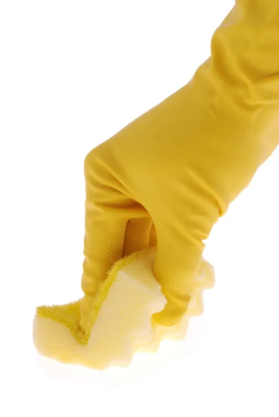 Резиновая перчатка и желтая губка — стоковое фото