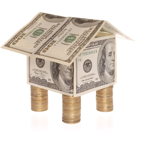 La casa da dollari costa su monete . — Foto Stock