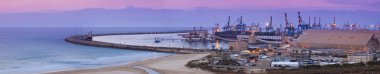 Panoramic shot of Harbor at sunset clipart