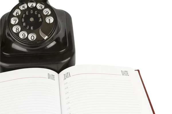 stock image Vintage black phone and organizer