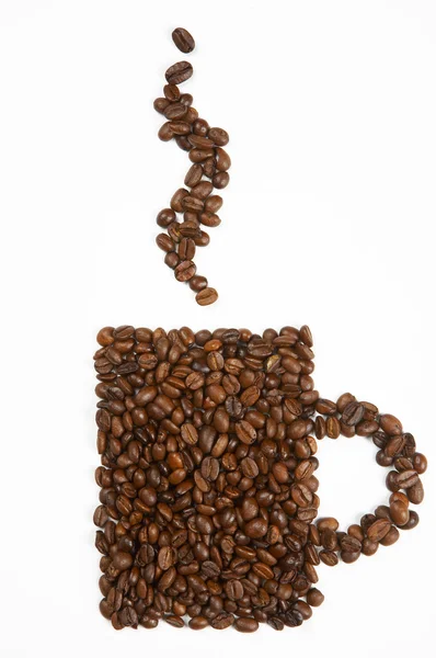 Mug shape made from coffee beans — Stock Photo, Image