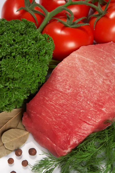 Raw fresh meat with tomato — Stock Photo, Image
