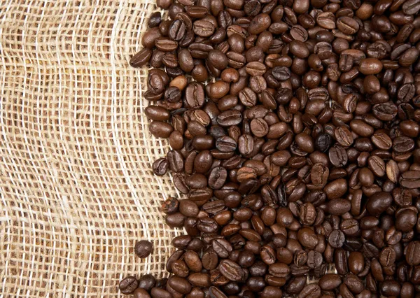 Coffee beans on a canvas — Stock Photo, Image