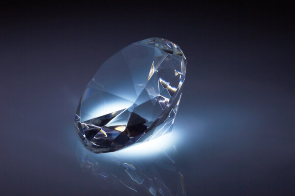 Diamond jewel on dark blue