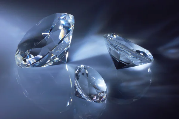 Shiny diamonds jewel on dark blue — Stock Photo, Image