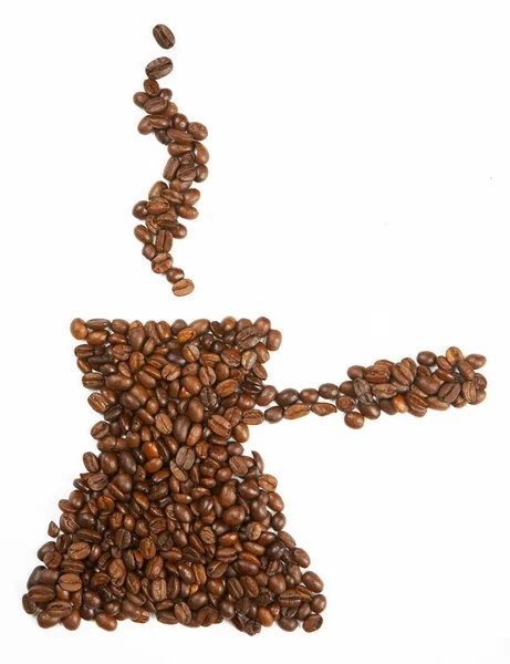 Форма кружки из кофейных зерен — стоковое фото