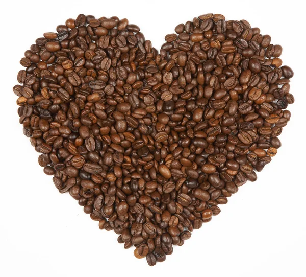 Kształt serca wykonany z ziaren kawy — Zdjęcie stockowe