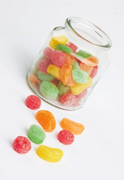 Colorful candy in glass jar — Stock Photo, Image