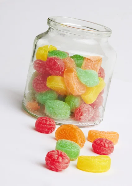 Colorful candy in glass jar — Stock Photo, Image