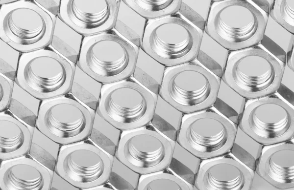 Metal nuts background — Stock Photo, Image