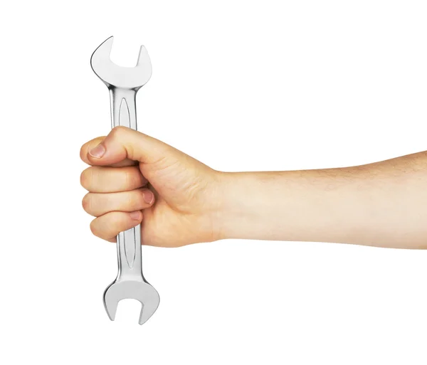 Metal spanner in hand — Stock Photo, Image