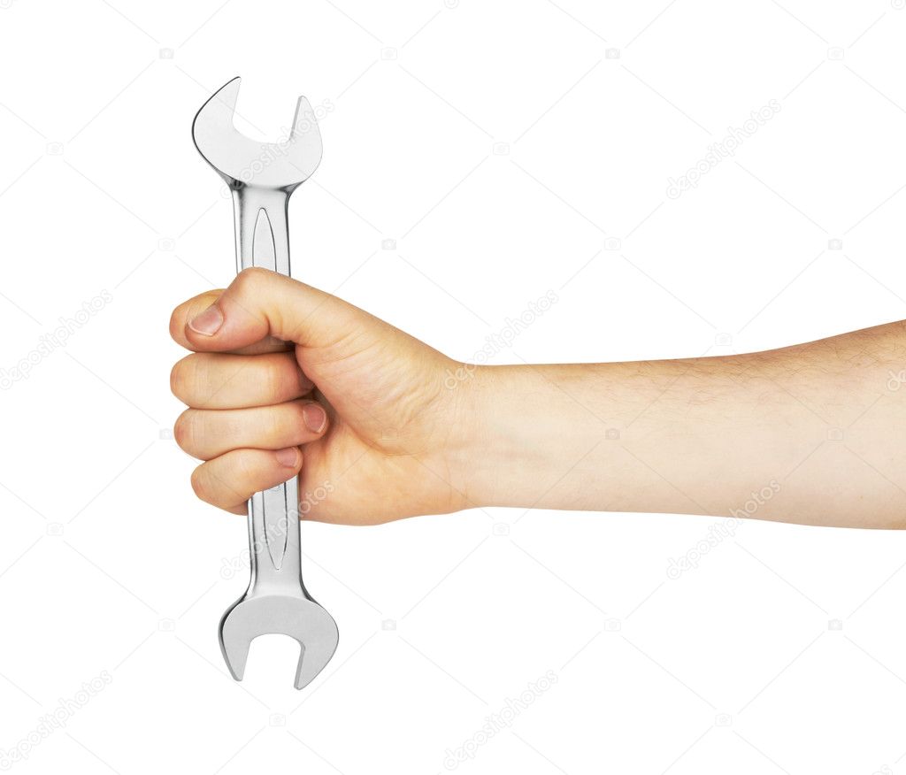 Metal spanner in hand