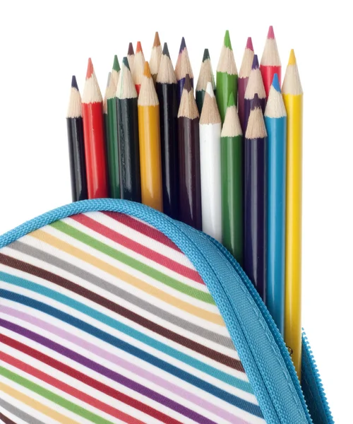 Penna fall med färgglada pennor på nära håll Stockbild