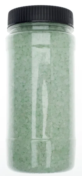 Glas mit wohltuenden Badesalzen Stockbild