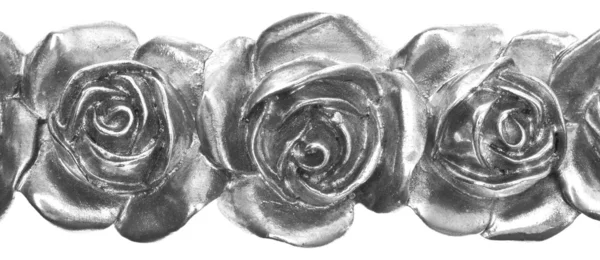 Zblízka stříbrné kovové růže — Stock fotografie
