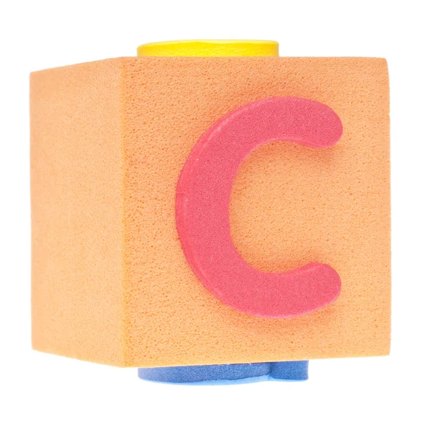 Буква C на пеноблоке — стоковое фото
