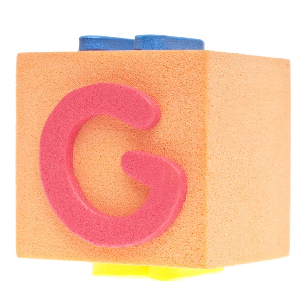 Litera g na blok pianki — Zdjęcie stockowe