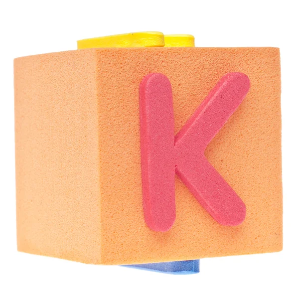 Lettera K sul blocco di schiuma — Foto Stock