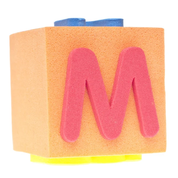 Lettera M sul blocco di schiuma — Foto Stock