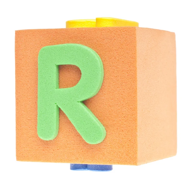 Carta R sobre o bloco de espuma — Fotografia de Stock
