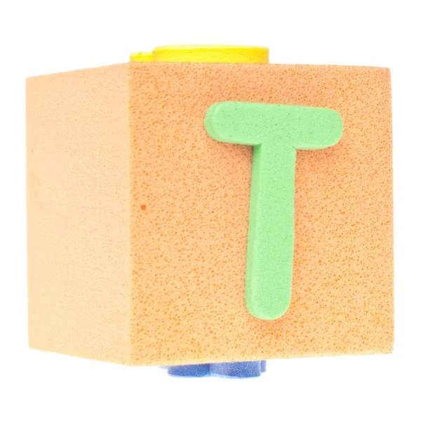 Letra T sobre Bloque de espuma — Foto de Stock