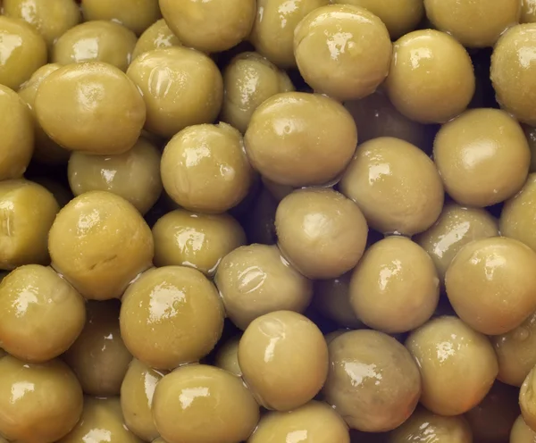 缶詰のエンドウ豆の背景を閉じる — ストック写真