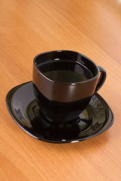 テーブルの上のマグカップ — ストック写真