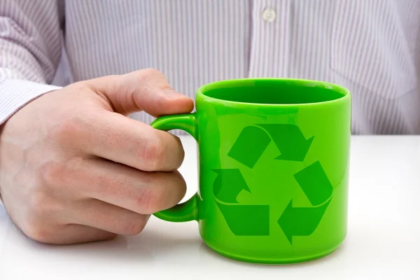 Green cup with recycled symbol — Stock Photo, Image