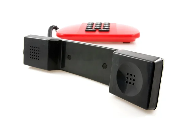 Telefono rosso con ricevitore nero — Foto Stock