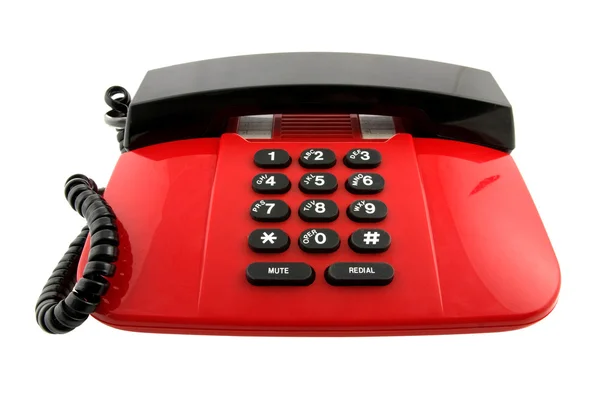 Красный телефонный аппарат, изолированные на белом фоне — стоковое фото