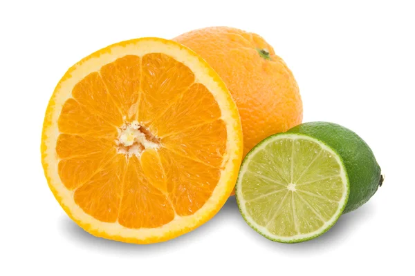 Narancssárga gyümölcs és zöld citrom. — Stock Fotó
