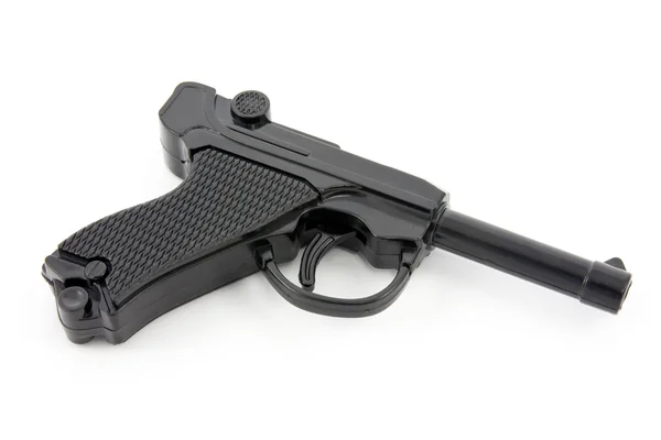 Czarny pistolet z tworzyw sztucznych. — Zdjęcie stockowe